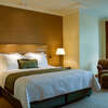 bigstock-Classic bedroom of a 5 star luxury suite hotel with attached living room.jpg